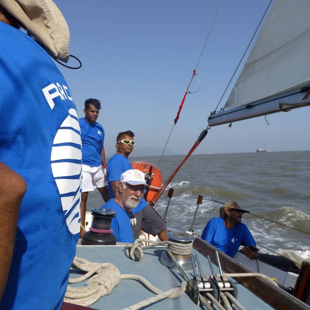 Mumbai Harbour Sailing Team wearing royal blue polo shirt with custom print - Delivered in 