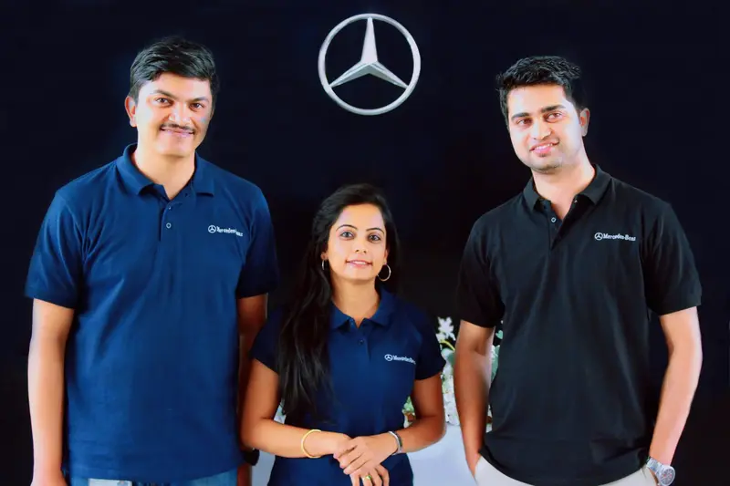 Mercedes leadership team wearing Navy Blue Cotton Polo Shirts with mercedes logo embroidered